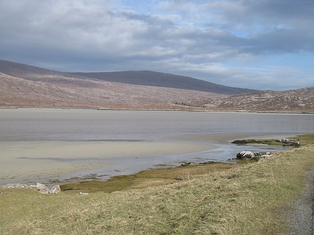 Tràigh Losgaintir Low water exposes the sands of this filled in sea loch on the west coast of Harris. Other than the rivers, the inlet behind Corran Sheileboist completely dries to sand at low water.