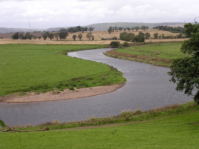 The River Isla near Coupar Angus. The River Isla is a tributary of the Tay. The view of this meandering section of the river is taken from GR 217404