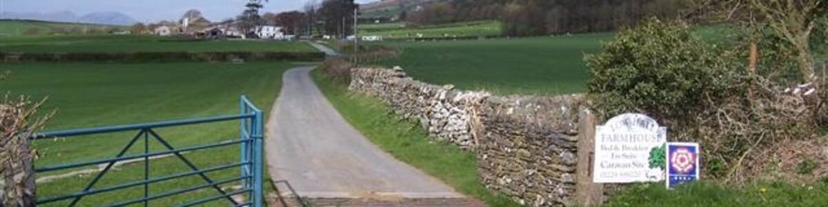 Photo "Low Hall Farm and Caravan site. Diversification on the farm has provided a lovely area for a caravan site." by John Holmes (Creative Commons Attribution-Share Alike 2.0) / Cropped from original
