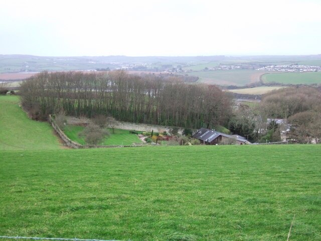 The Old Stables, Halwell House Now converted, with a walled garden. Frogmore Creek, and Halwell Farm and House can all be glimpsed through the surrounding trees.