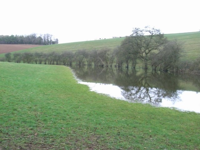 Not so dry valley now! Looking along a flooded Winterwell brook towards Middleton Copse. Contrast this with 286538.