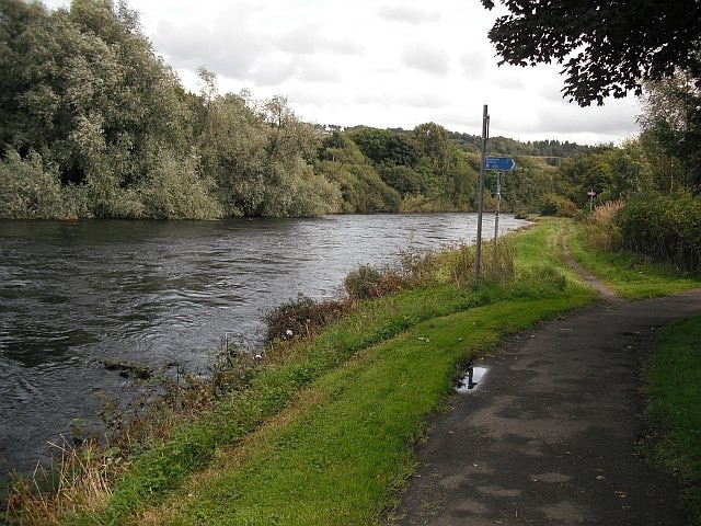 River Leven The cycle path (NCN 7)leaves the river ever so briefly to rejoin it a few metres on by path and about 1km further on by river. The river forms a big loop here and the path just cuts across the neck.