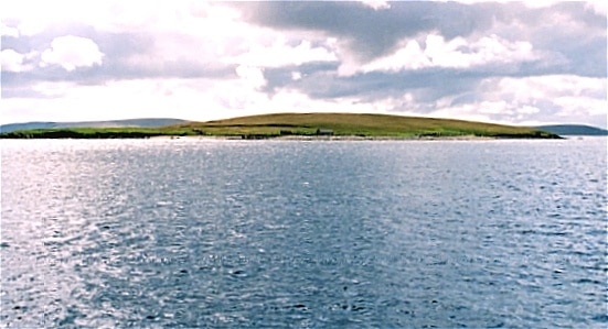 Bluemull Sound. Most of this square is sea. However the north end of the island of Linga makes up most of the few acres of land in the square. In the distance is Fetlar.