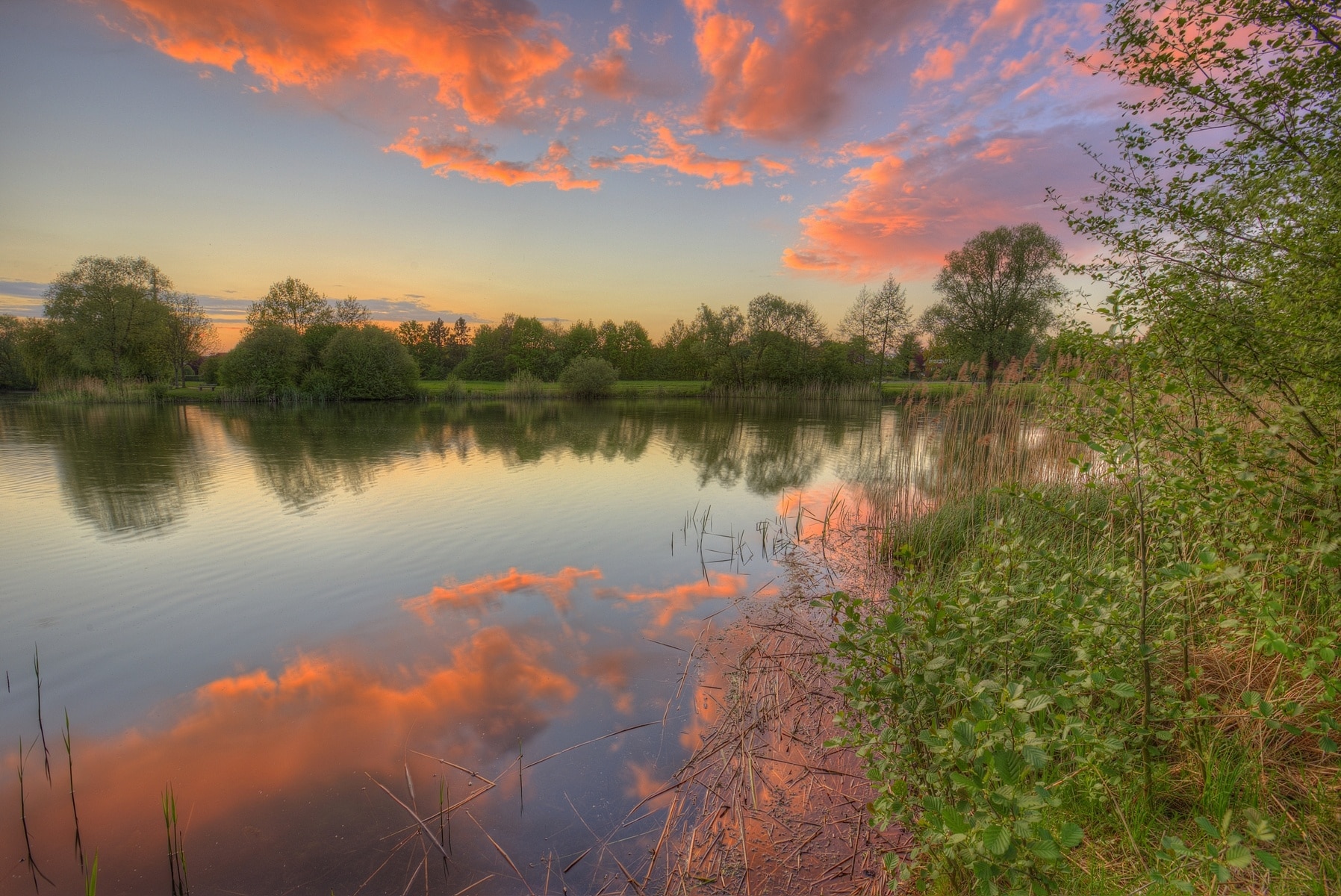 Sunset over the Thielenburger Lake in Dannenberg, in Lower Saxony (Germany).