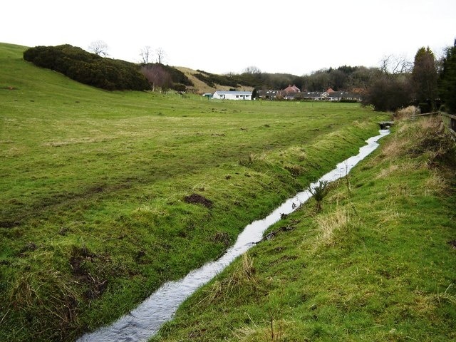 Cloughton Beck and Fields The beck runs down the west side of the village, in the distance can be seen the cricket pitch and pavilion