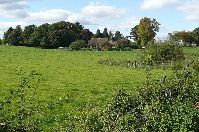 Frilsham Park Close to the motorway but well screened from it by the trees to the left.