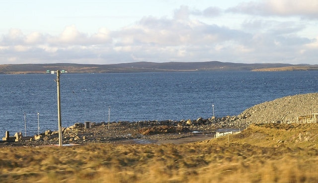 Former ferry terminal at Oddsta, Fetlar Almost all the buildings and fittings have been removed, but the concrete jetty where the ro-ro ramp was installed is just visible on the extreme left.