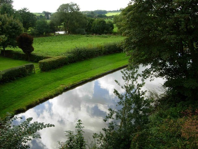 Trent & Mersey Canal, Salt. At this point the canal is sandwiched between the River Trent (just visible beyond the field), the Colwich - Stone railway and the A51 (out of shot to the right).