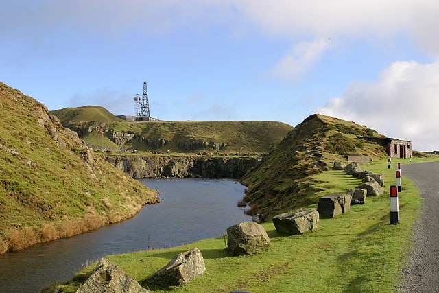 Titterstone Clee Old dolerite quarry workings at Titterstone Clee, Shropshire. The masts of the National Air Traffic Service are in the background.