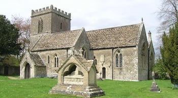 Parish church of St John the Baptist, Hinton Charterhouse, Somerset, seen from the southeast. In the foreground is the chest tomb of Thomas Marlbro, who died in 1853.