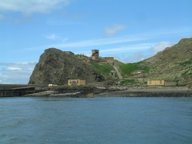 Lumpy little island Military buildings on Inchkeith. The lighthouse is out of this picture, to the right.