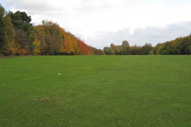 The 11th fairway, Newbold Comyn Golf Course, Royal Leamington Spa Seen from the public footpath that crosses the course. Seasonal change exhibited by the trees is a feature of the whole of Newbold Comyn Park.