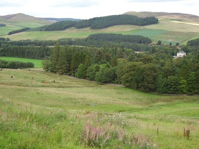 Grazing land, Tweeddale. View down towards the river from Caverhill, Peeblesshire. The white tape is electric fencing of a type normally used with horses.