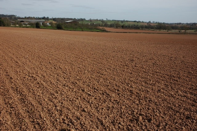 Drews Farm viewed from the Poet's Path II View across a ploughed field from the Poet's Path II from between Rosehill Farm and Drews Farm.