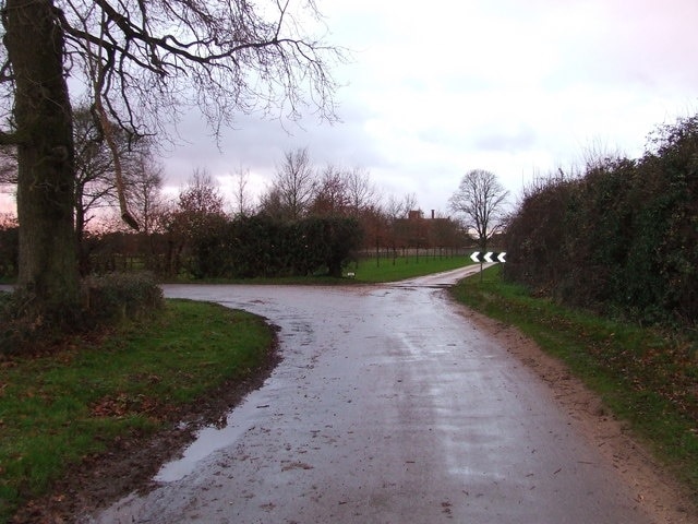 Lodge farm entrance Entrance to lodge farm of sharp left hand bend near to Hilborough Norfolk.