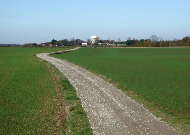 East of Great Hatfield, East Riding of Yorkshire, England. Looking north-northwest towards Mappleton Water Tower from a bridge over the drain on the bridleway between Mount Pleasant Farm and Mappleton Road.