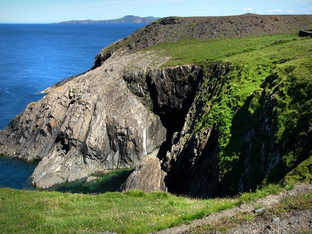 Coastal scenery near Porthgain Garn Fawr and Strumble Head visible in the distance