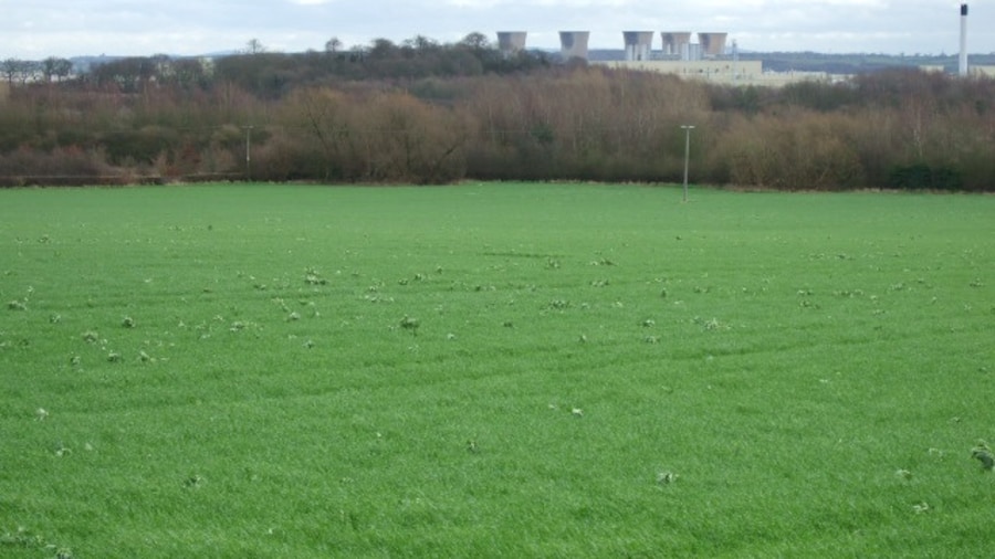 Photo "Arable field Looking across the grid square with the Toyota Car Factory in the background." by John Poyser (Creative Commons Attribution-Share Alike 2.0) / Cropped from original