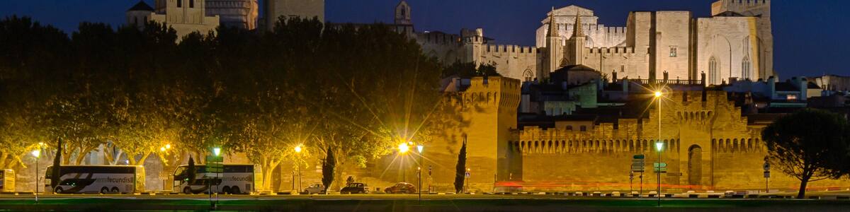Photo "Palace of the Popes at night / Avignon, France" by Sergey Ashmarin (Creative Commons Attribution-Share Alike 3.0) / Cropped from original