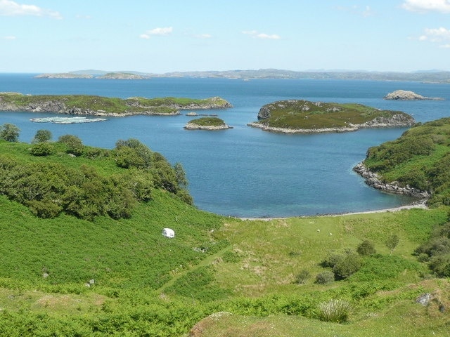 The view north from Drumbeg Loch Dhrombaig this side of the islands and Eddrachillis Bay beyond.