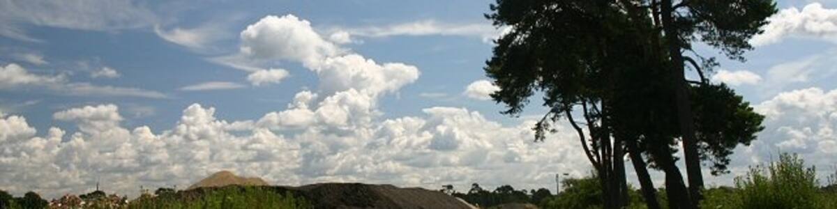 Photo "Sand and gravel dump This track leads to an area where sand and gravel is stored, close to the US Air Force base at RAF Lakenheath." by Bob Jones (Creative Commons Attribution-Share Alike 2.0) / Cropped from original