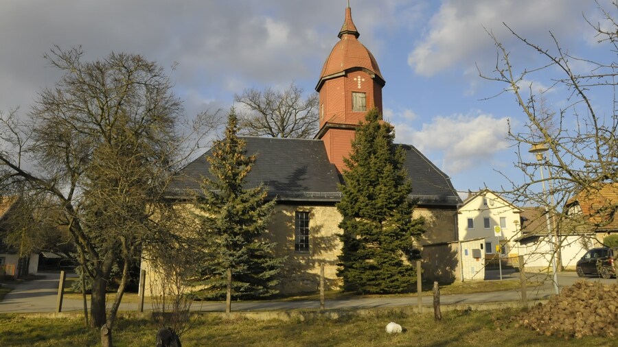 Photo "St.-Hubertus-Kirche in Oßmaritz" by CTHOE (Creative Commons Attribution-Share Alike 3.0) / Cropped from original