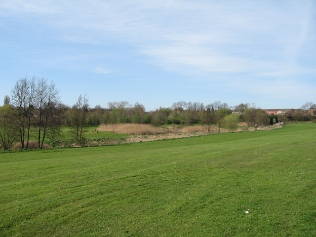 Millbrook Park Millennium Green Millbrook Park Millennium Green is an expansive area of public open space providing an impressive backdrop to the ancient St. Chads Church. Although adjacent to the centre of Kirkby, (Mill) Brook runs through the middle of the site and trees border the edge making it a peaceful retreat.