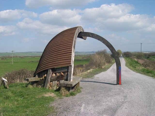 A "clinker built" shelter. On an exposed section of the cycle path around the Taw estuary.