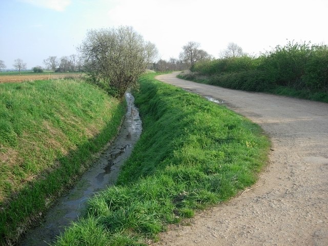 Ditch and access road Access to Fen Drayton Lakes (gravel pits) from Fen Drayton village.