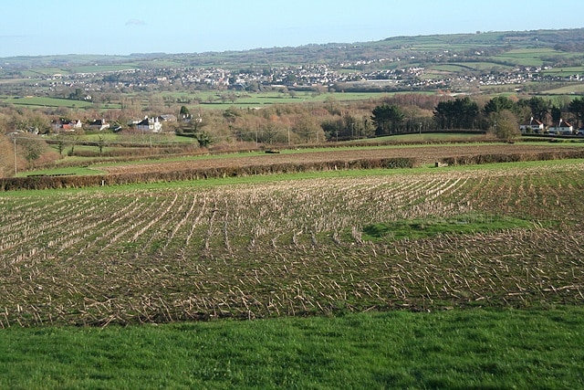 Kilmington: towards the Axe valley Seen from Hampton Road with Axminster in the distance. Looking east-north-east