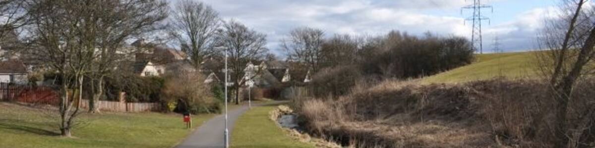 Photo "Lyne Burn Footpath at Touch end" by Robert Struthers (Creative Commons Attribution-Share Alike 2.0) / Cropped from original