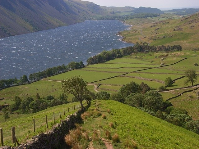 Southwest ridge of Yewbarrow Looking down the ridge to pastures at Bowderdale and along the southern end of Wast Water.