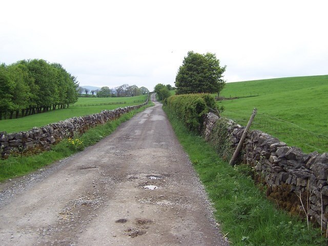 Moorber Lane. Unmetalled lane that swings under a green hill of the same name, en route from Stainton Cotes to Coniston Cold