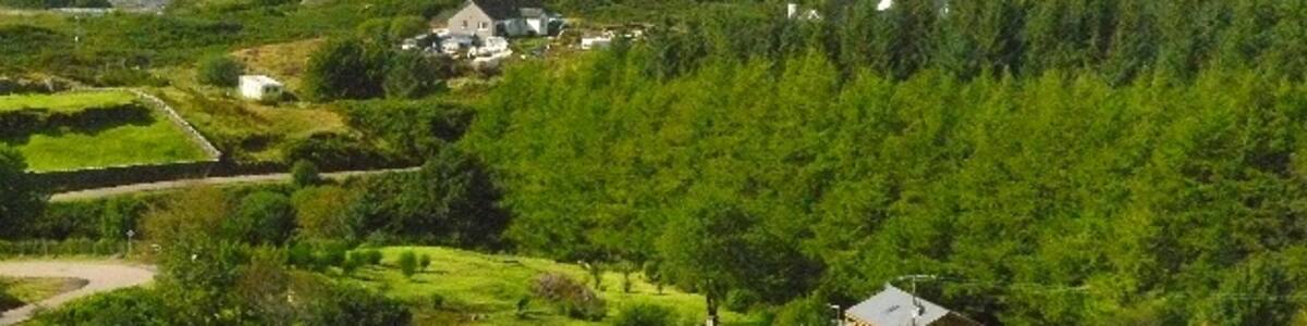 Photo "View of Dervaig from scenic overlook" by Wendy Kirkwood (Creative Commons Attribution-Share Alike 2.0) / Cropped from original