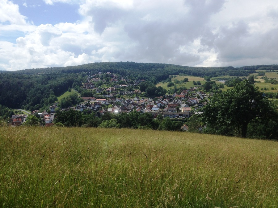 View of the vilage of Heimbuchenthal, Aschaffenburg district, Bavaria, Germany. Seen from the Panoramaweg to the east, June 2016.
