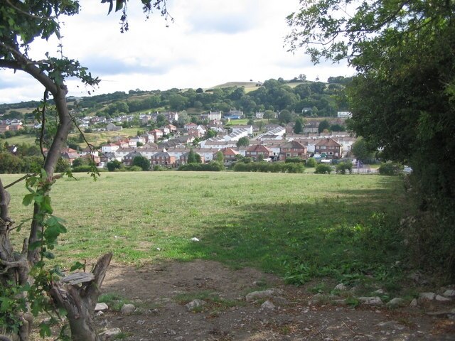 The Holway estate. A view looking south from a field entrance on the track to Moor Farm, showing the Holway estate and Pen-y-Ball hill behind.