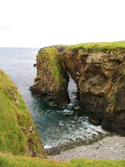 Natural arch, Poll Eistean The arch appears to have developed along a natural split in the rock. Only a matter of time before it becomes a sea stack.