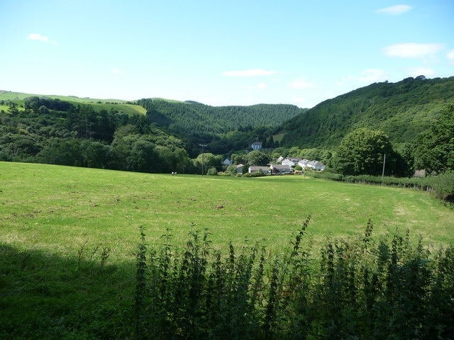 Aberhosan village viewed from near Ty-gwyn farm, near to Aberhosan, Powys, Great Britain. The small village is nestled in its sheltered valley.