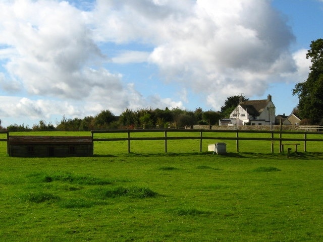 Horse jump and stile near Sherston On a footpath, looking back towards the village.