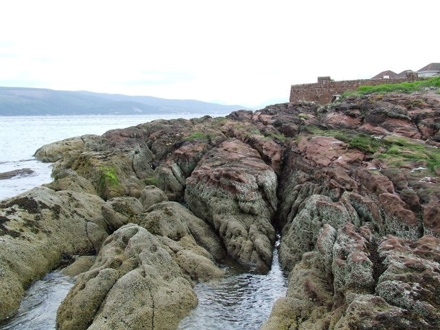 Red Rocks On the beach near Wemyss Bay Road. The wall in the background is made of the same sandstone and marked the boundary of Castle Wemyss Estate.