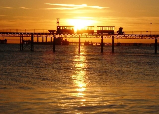 Sunrise - Hythe Pier Railway The Ferry to Southampton runs every half hour from the end of Hythe Pier. This Pier Train carries those that do not want to walk the length to the ferry and back. It is used by a great number of commuters as well as shoppers.