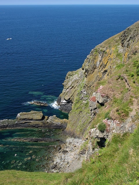 Peel to Glenmaye coastal path at Ellan ny Maughol. Isle of Man. The footpath runs from Peel hill to Glen Maye, a distance of about 4 kms. and for most of this distance it follows the cliff edge.