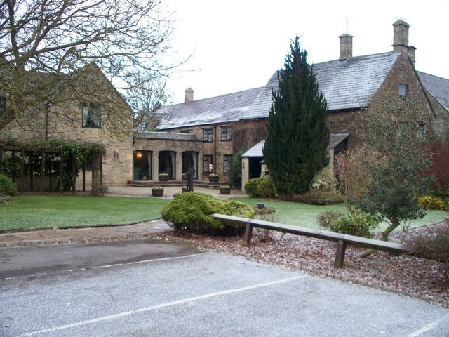 Mill House Hotel The country hotel in Kingham is seen from the car park through which runs the footpath to Bluewood Park.