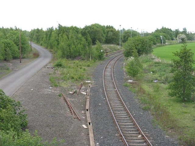 Little used railway line Looking north from the B6415 at Millerhill, towards the Marshalling Yard.