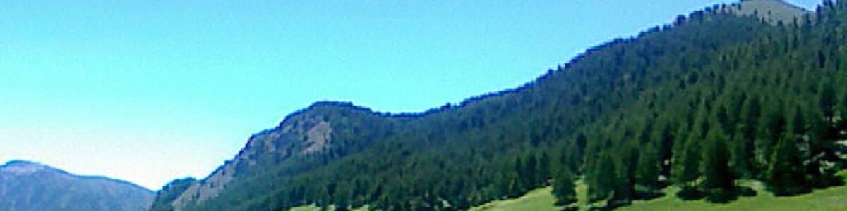 Photo "Mt. Aucellier from Longon Valley" by Santiago Puig Vilado… (Creative Commons Attribution-Share Alike 3.0) / Cropped from original