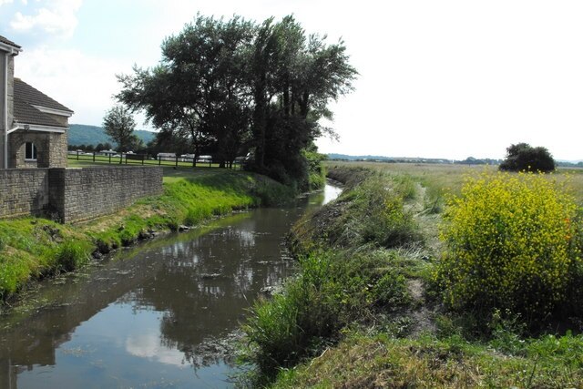 West End farm Caravan Park Here at the edge of the park is the Rhyne that runs eventually down to Uphill village