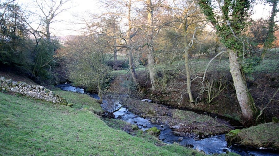 Photo "Lance Beck below Mire Lane Rising on the moor above Booze Wood, Crook Beck becomes Lance Beck as it enters Cotherstone. Here it flows under Mire Lane and makes its way a short distance to join the River Tees." by Andy Waddington (Creative Commons Attribution-Share Alike 2.0) / Cropped from original