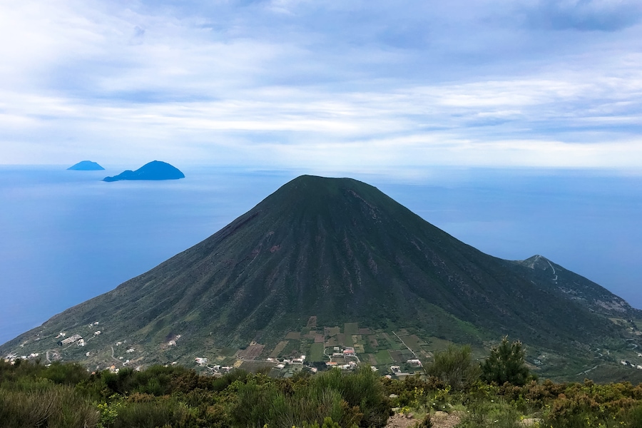 view from the top of Monte Fossa delle Felci (964m) towards Monte dei Porri (886m) and the islands of Filicudi (front) and Alicudi (back)