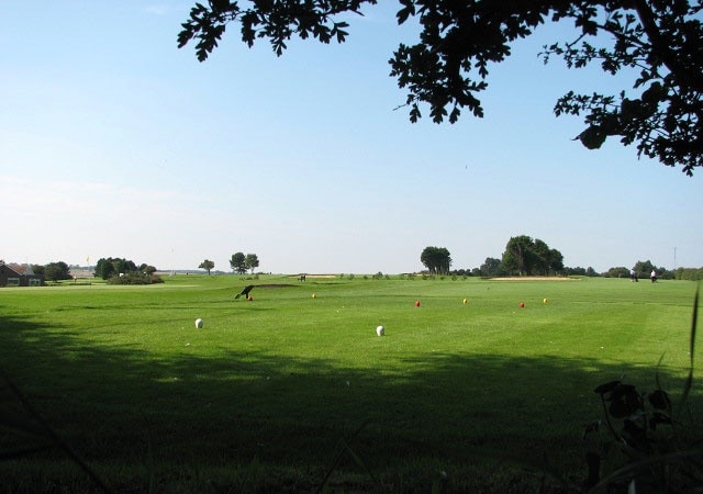 Glimpse of the golf course Beside Links Road.