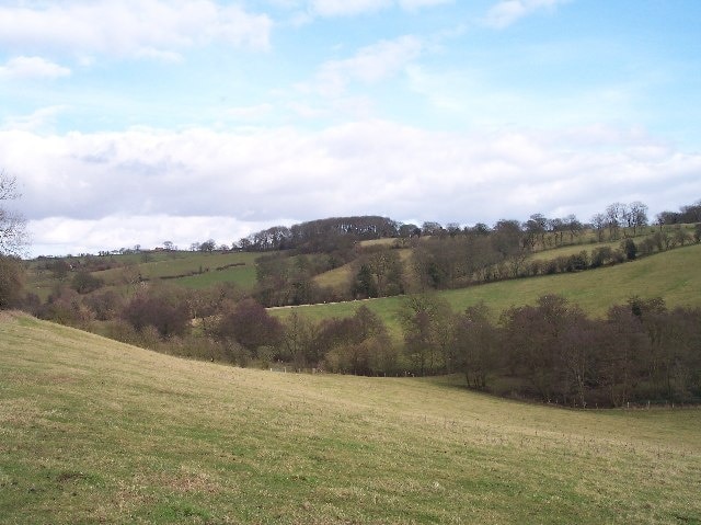 Odon Valley. Looking NE across the valley of the River Odon and up to Little Farm on the lefthand skyline.